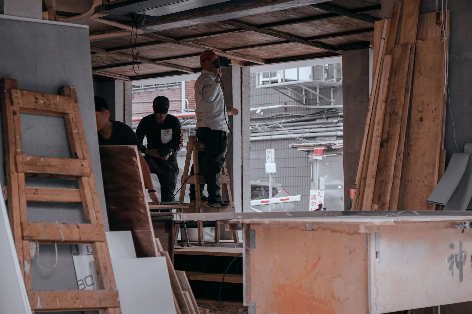 Shopfront, partitions and first fix, with the trades sequenced to keep off each other.